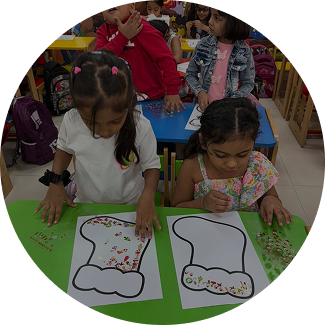 Children enjoying classroom drawing activities